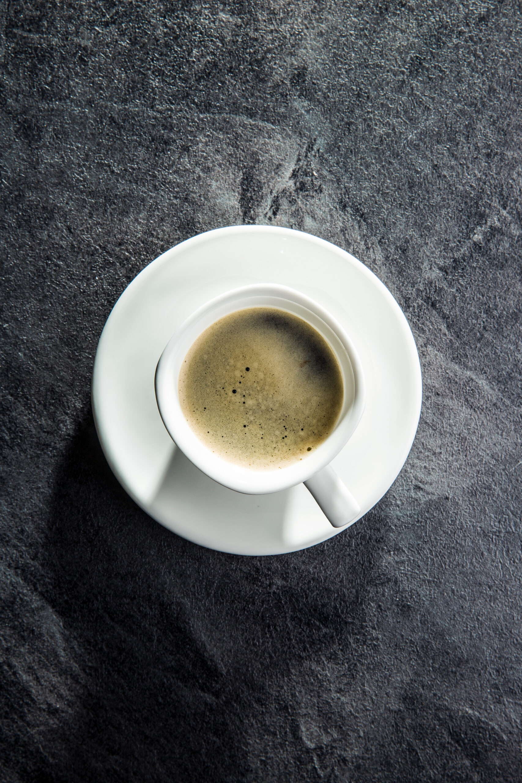 coffee cup from above on slate background 2026 01 09 09 52 28 utc